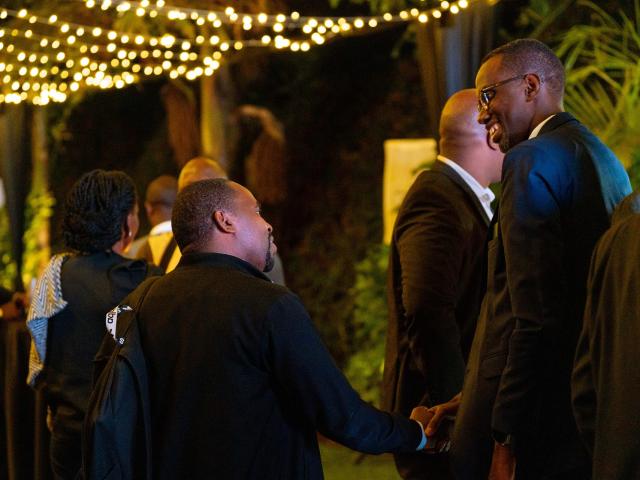 2 persons shaking hands