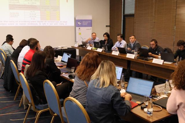 Participants discussing during workshop roundtable