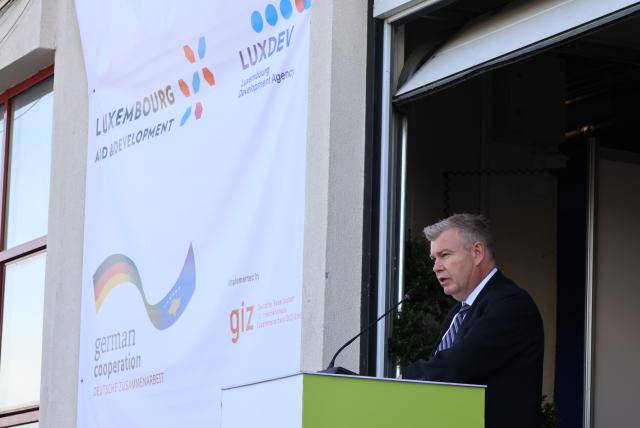Ambassador addressing the audience during opening