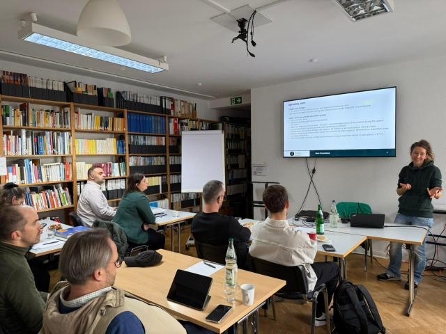 Participants listening to a lecture in a training room