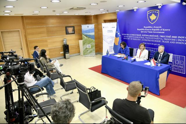 Government ministers and Luxembourg ambassador at a press conference